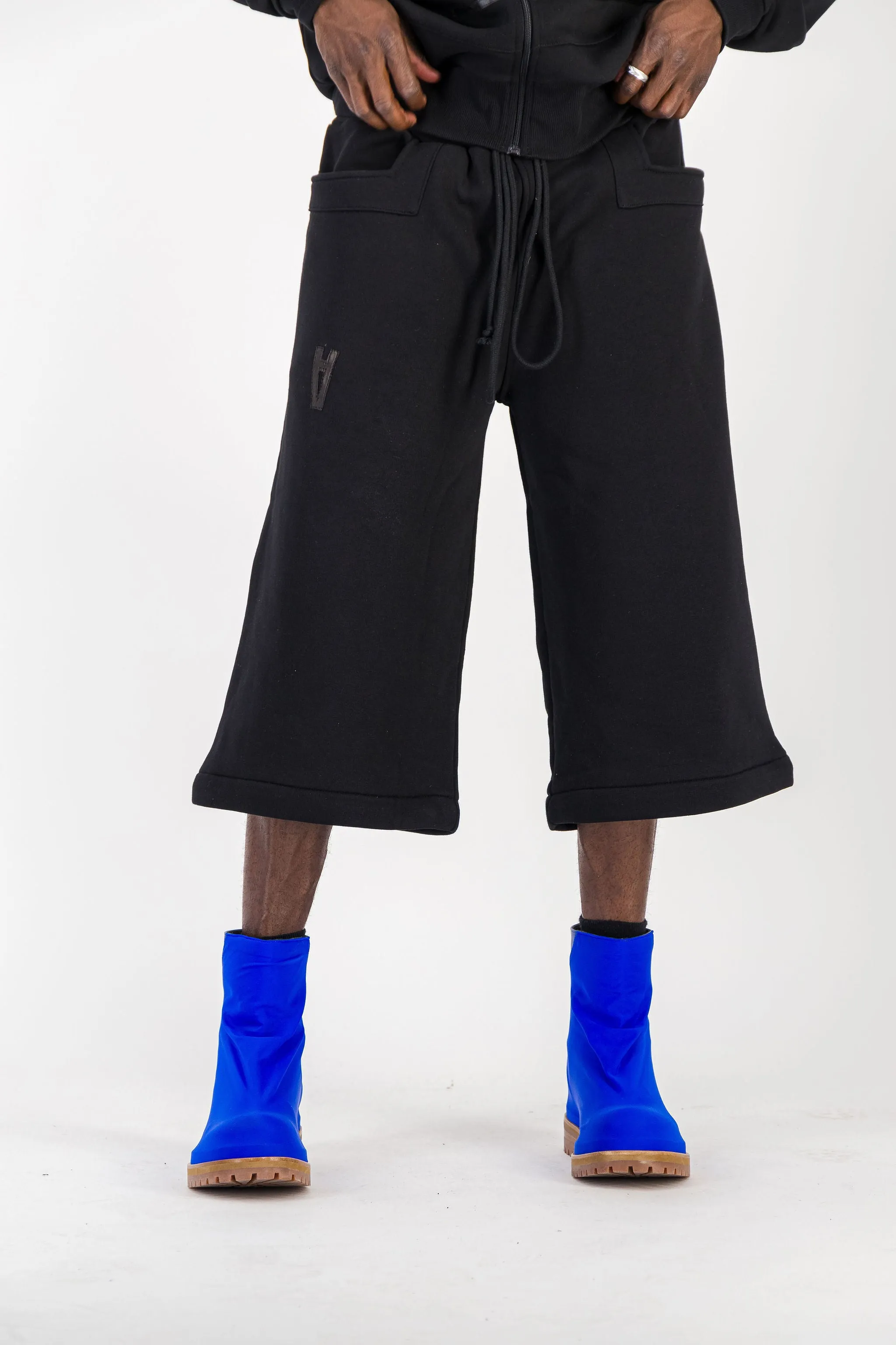 BLACK CONVERTIBLE JOGGER PANTS W/ LEATHER LOGO