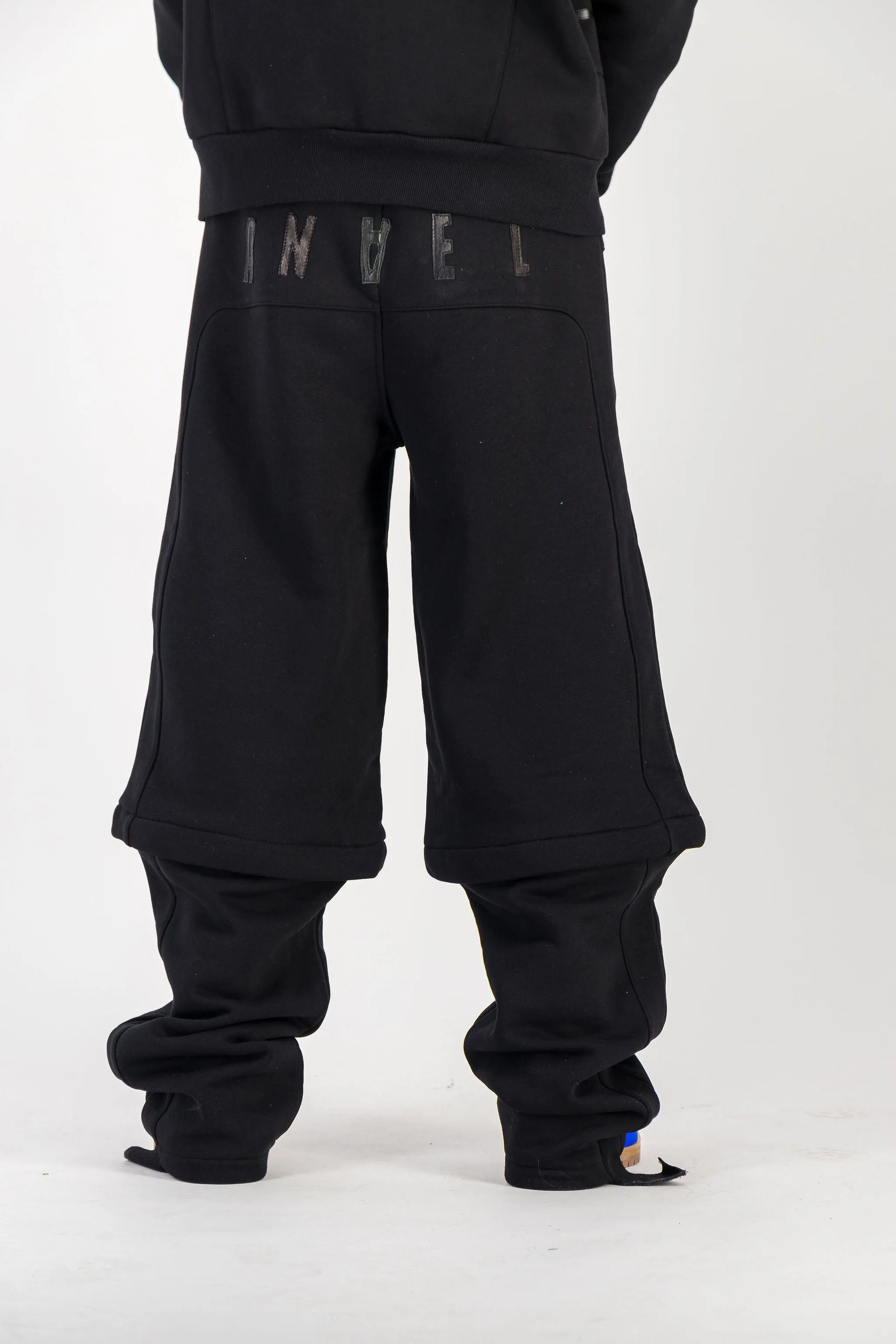 BLACK CONVERTIBLE JOGGER PANTS W/ LEATHER LOGO
