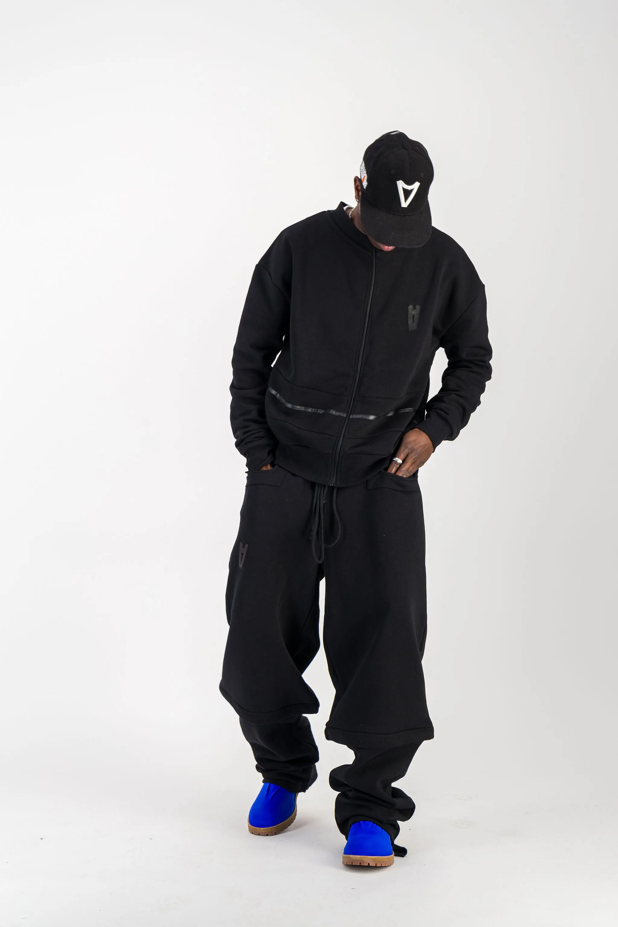 BLACK CONVERTIBLE JOGGER PANTS W/ LEATHER LOGO