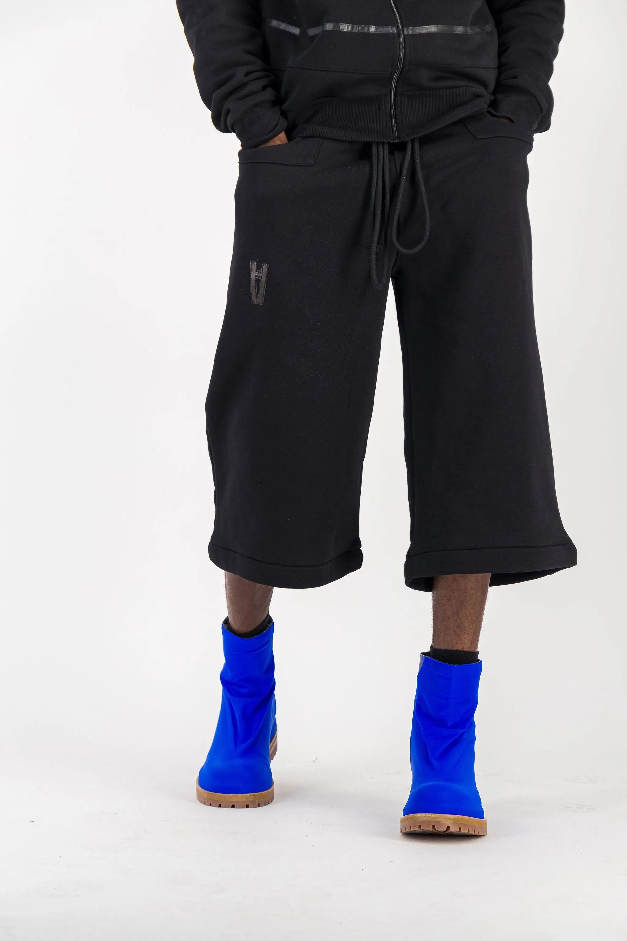 BLACK CONVERTIBLE JOGGER PANTS W/ LEATHER LOGO