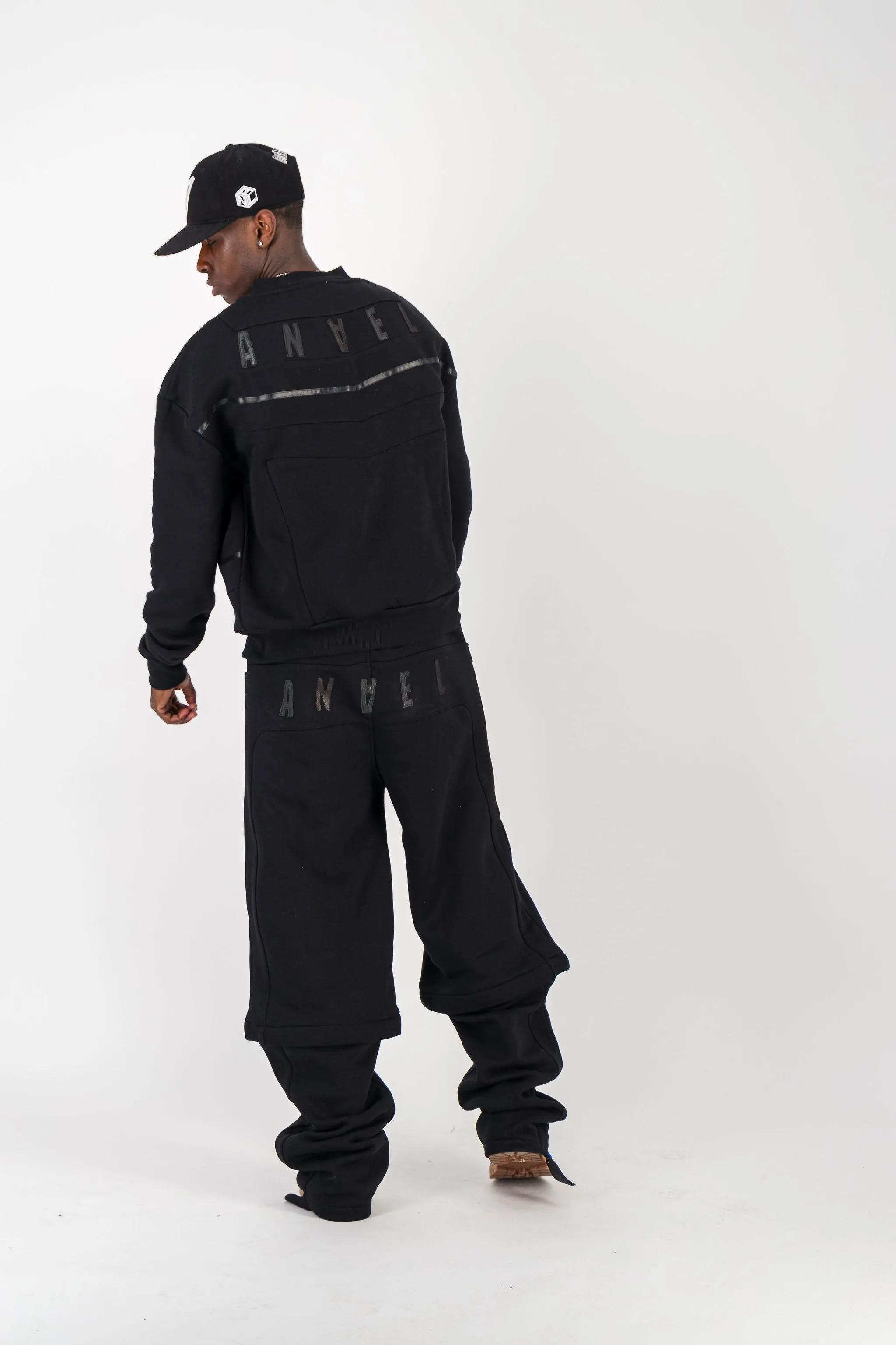 BLACK CONVERTIBLE JOGGER PANTS W/ LEATHER LOGO