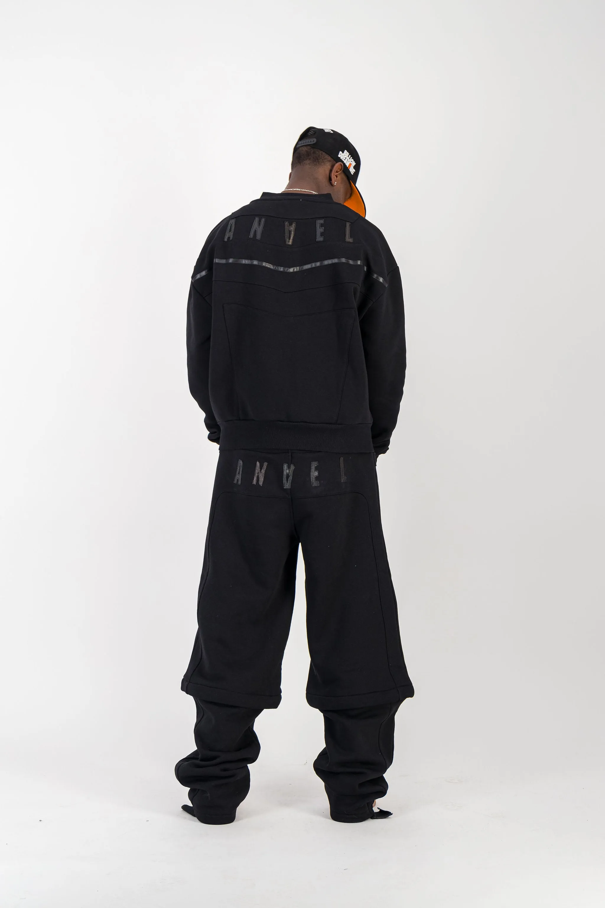 BLACK CONVERTIBLE JOGGER PANTS W/ LEATHER LOGO