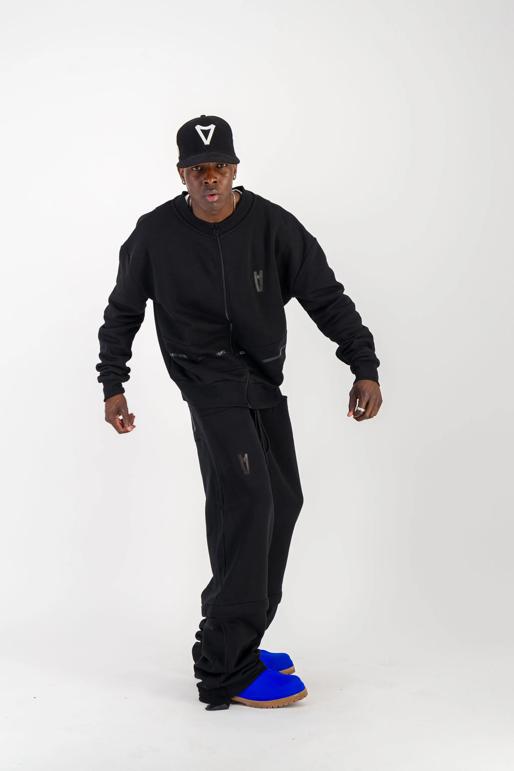 BLACK CONVERTIBLE JOGGER PANTS W/ LEATHER LOGO