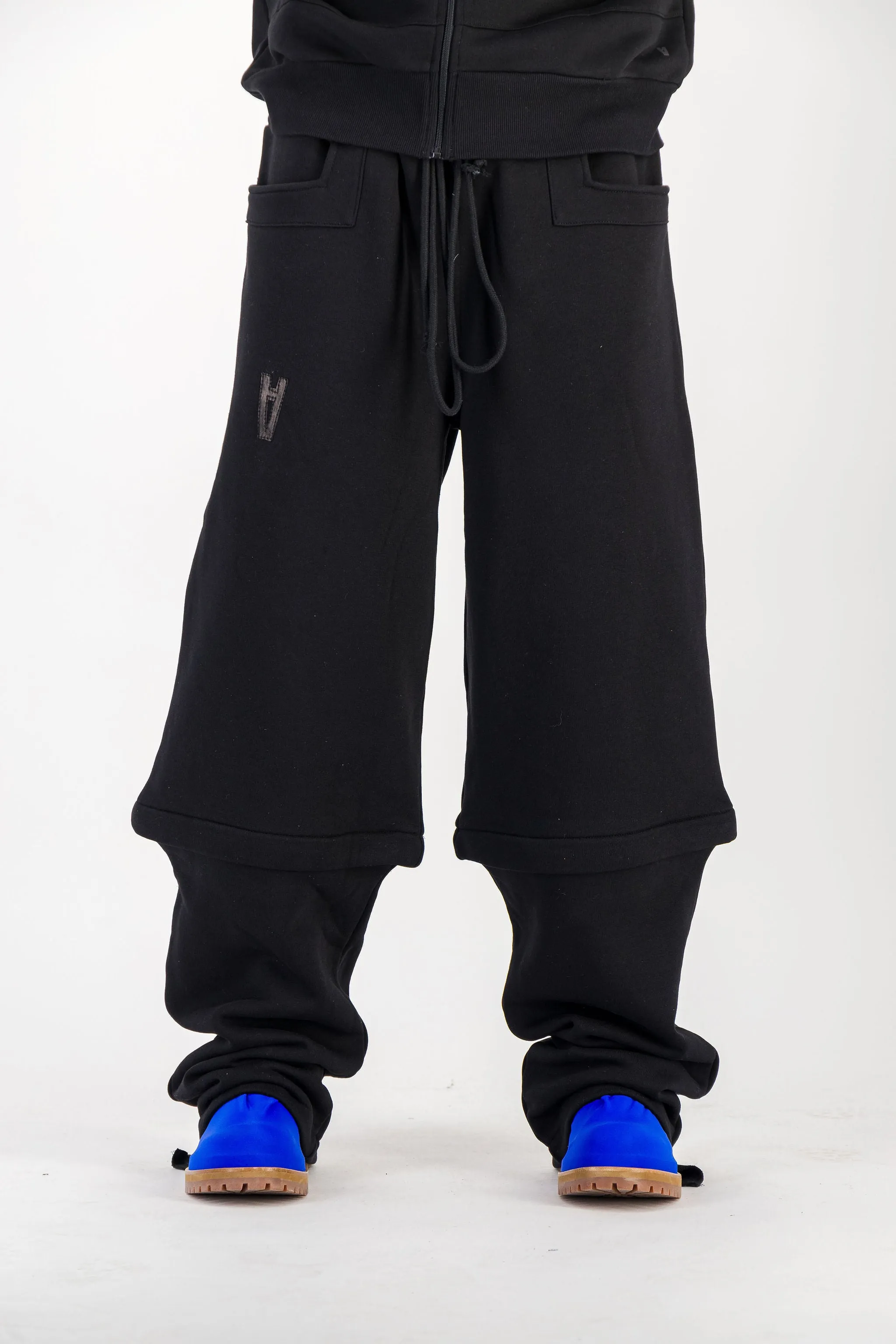 BLACK CONVERTIBLE JOGGER PANTS W/ LEATHER LOGO