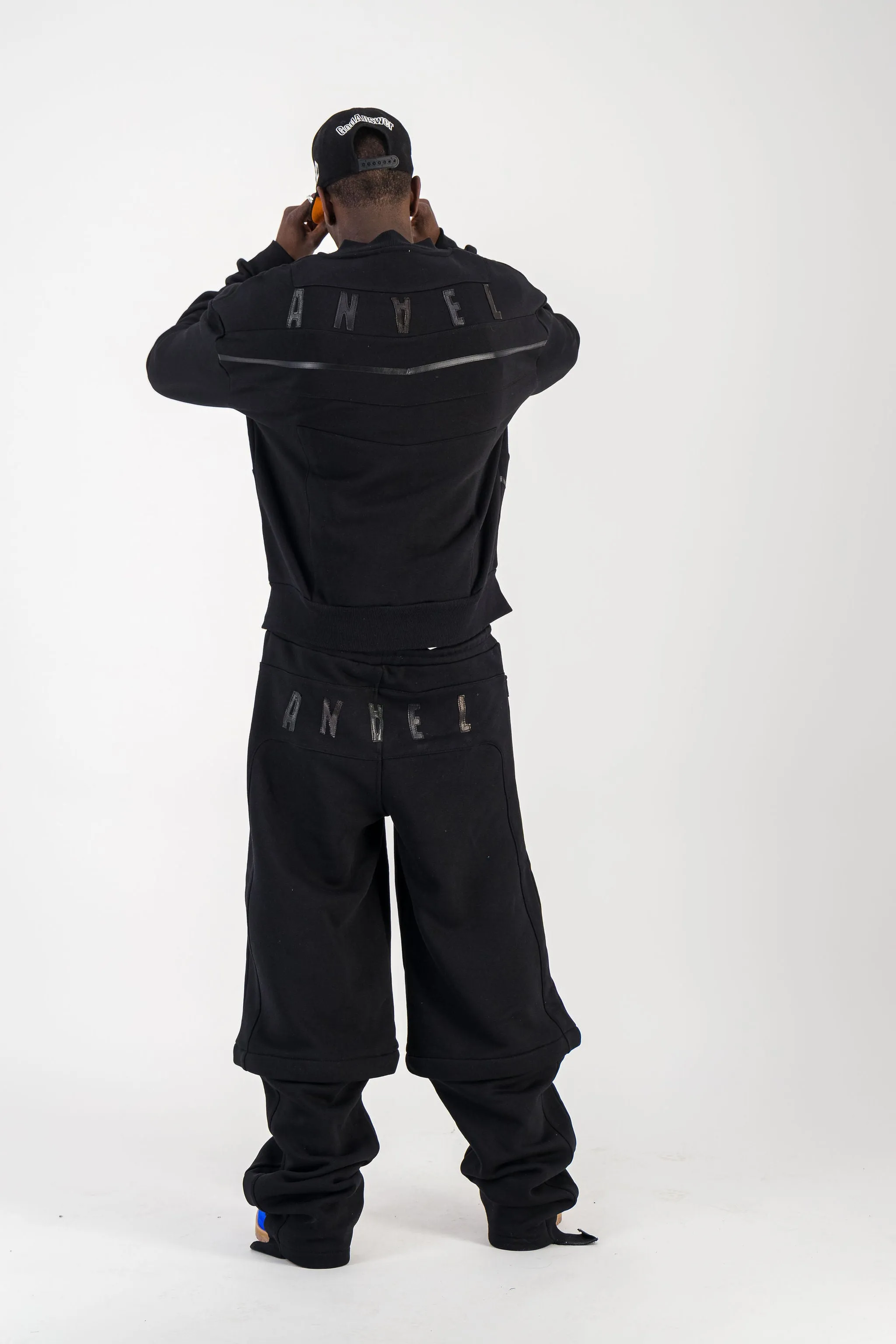 BLACK CONVERTIBLE JOGGER PANTS W/ LEATHER LOGO